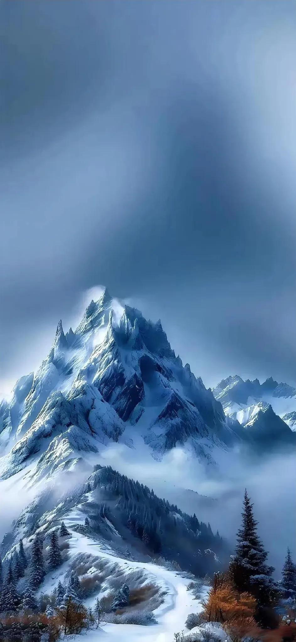冰雪覆盖的壮丽山峰，云雾缭绕，宛如仙境。