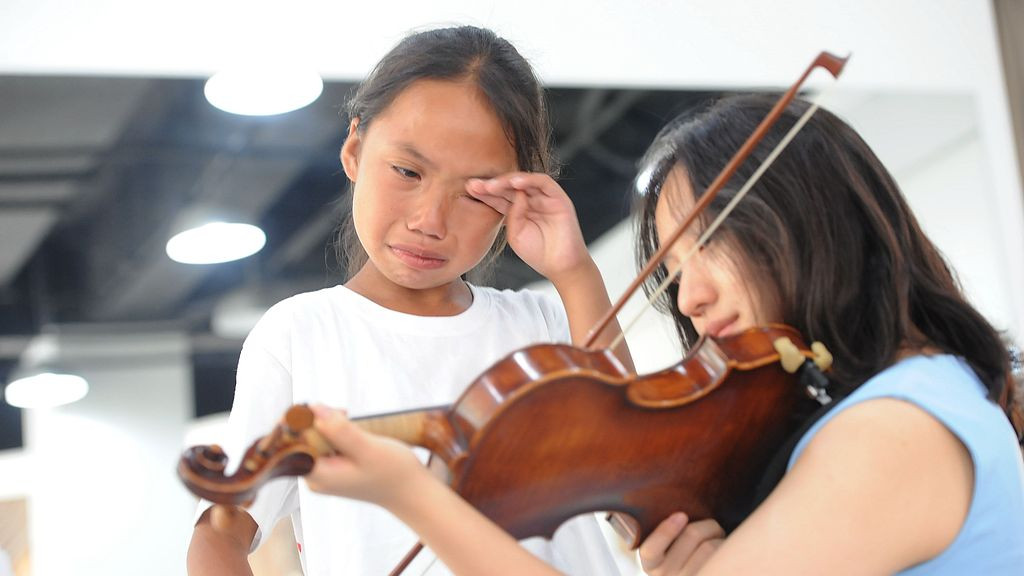 蹲下来，才能看到孩子的眼泪