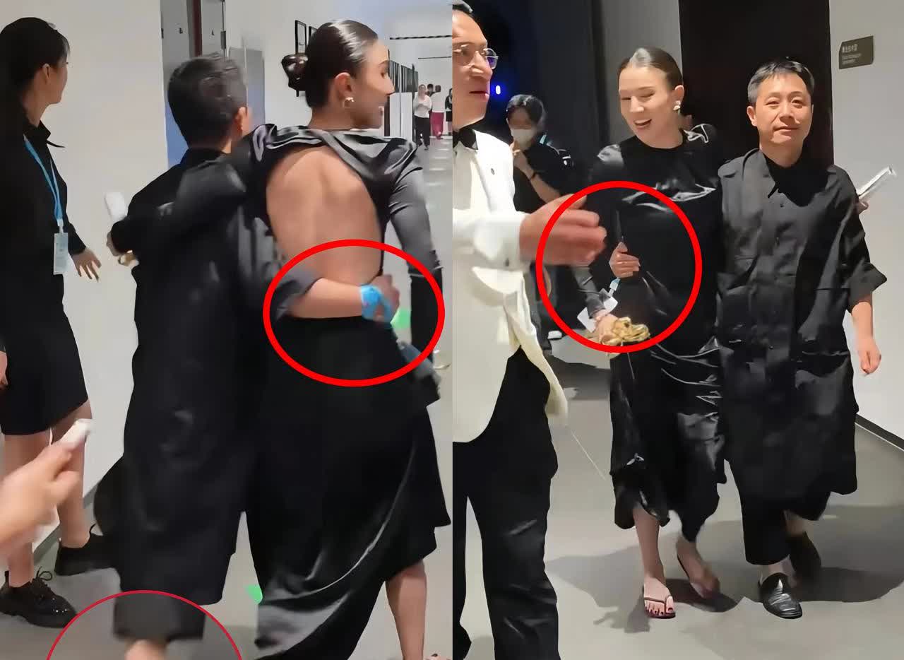 宋佳拿影后，
身边一神秘黑衣男子抢镜，
只见他紧紧搂着宋佳，一路护送前行。
