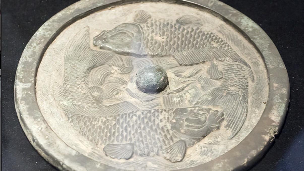 双鱼纹镜中的“阴阳八卦”密码：道教文化如何影响金代造物？
