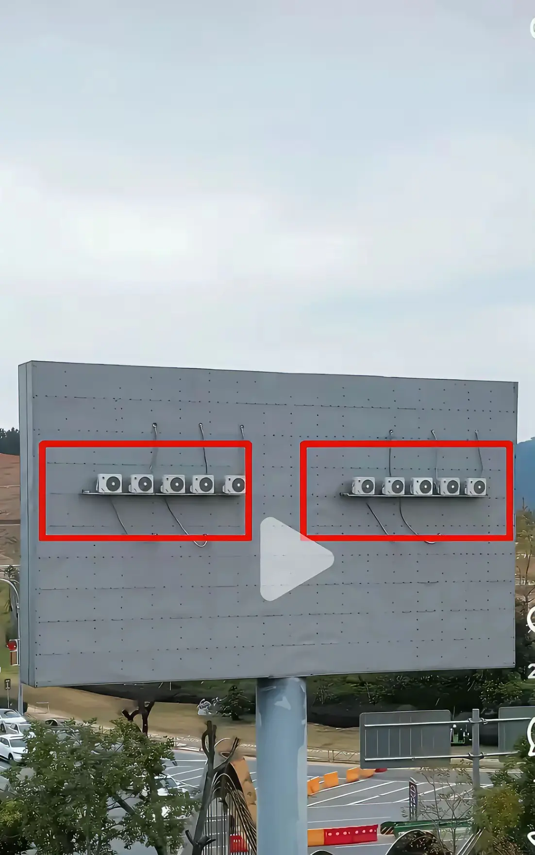 这广告牌里面怎么还安空调啊，难道里面住的人？