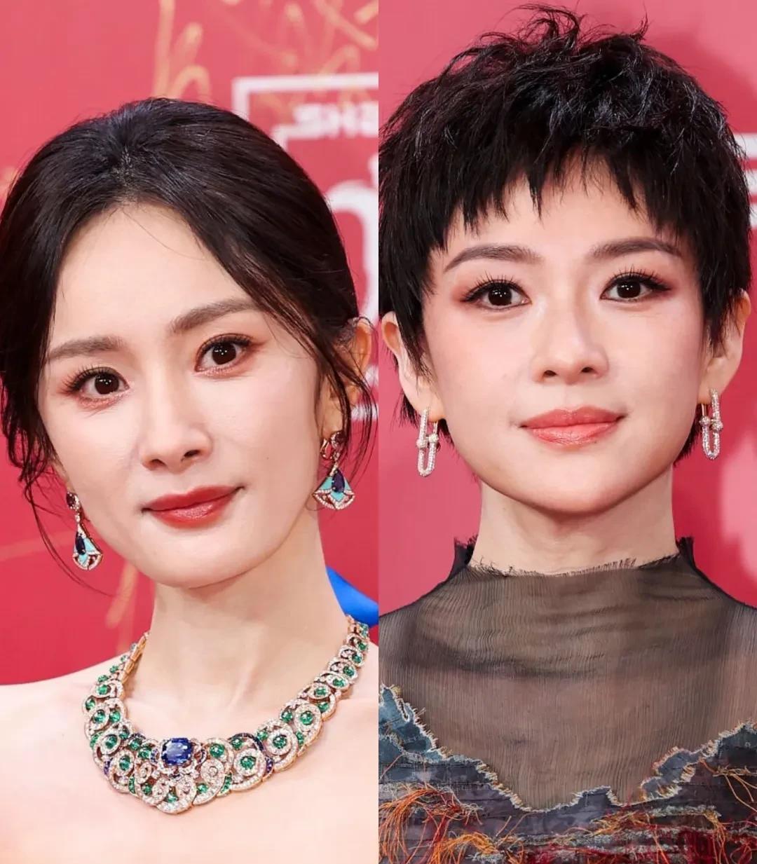 绝了，
杨幂，章子怡，
亮相上影节红毯上！
杨幂穿蓝色礼裙，戴华丽珠宝，明艳动人