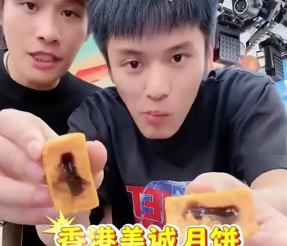 看到一条网友的评论“昨晚偶然间刷到了小杨哥的直播间，兄弟俩不敢露头只有一个牌子写