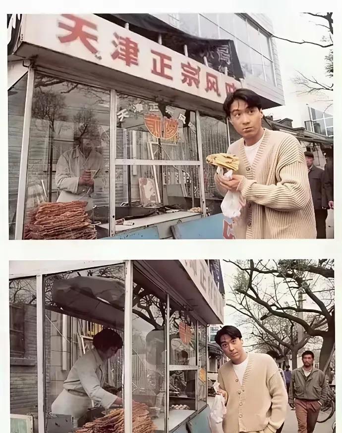 这时候的黎明真的好帅气，那一年黎明在北京录制专辑，品尝着街头的天津煎饼果子。
黎