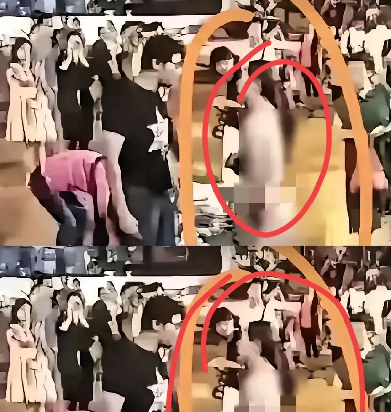 江苏靖江一女子因丈夫出轨，在大街上当众脱光了全身衣服，一边哭一边撕心裂肺地喊着：