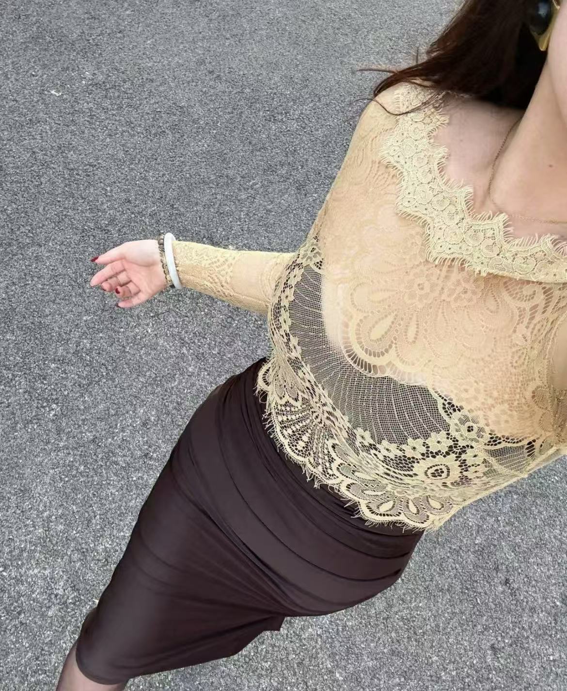 这件衣服怎么样？合身吗？