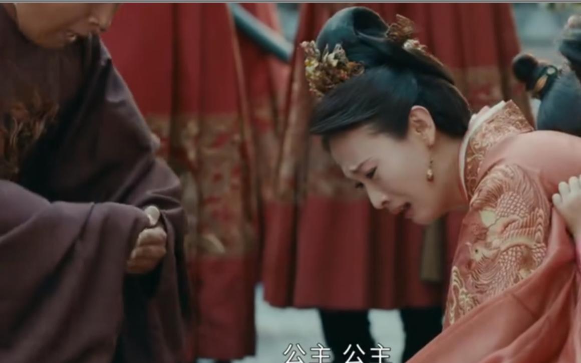 洪武三十年，安庆公主进宫见朱元璋，把外面的女装脱掉，露出里面的一品官服，哭喊道：