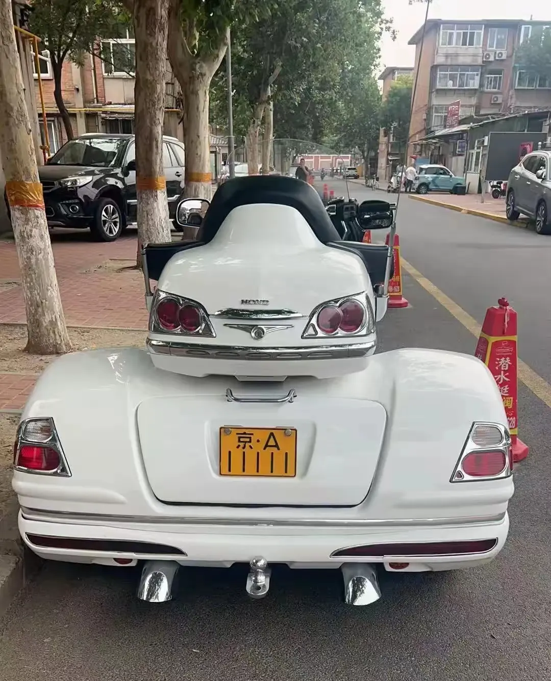 这辆摩托车加牌照，可以在北京换一套房吗？
