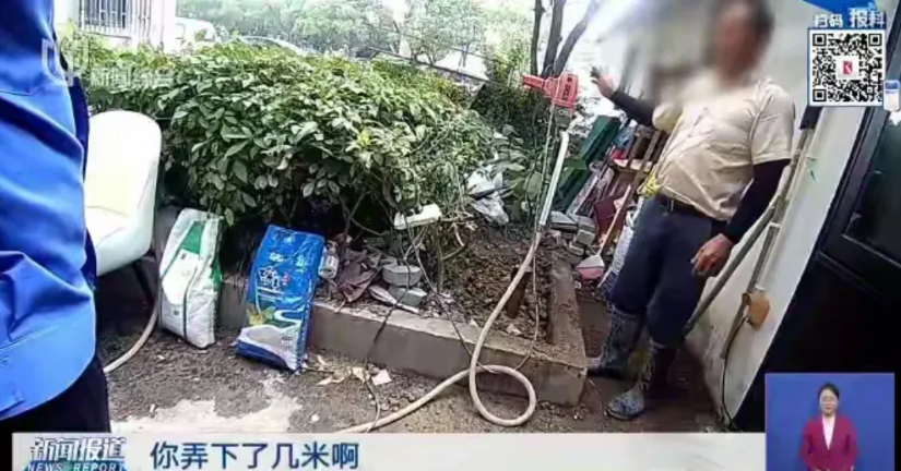 上海浦东，男子突发奇想在小区花坛里挖了一口井，才往下挖了20多米，结果被居委会发