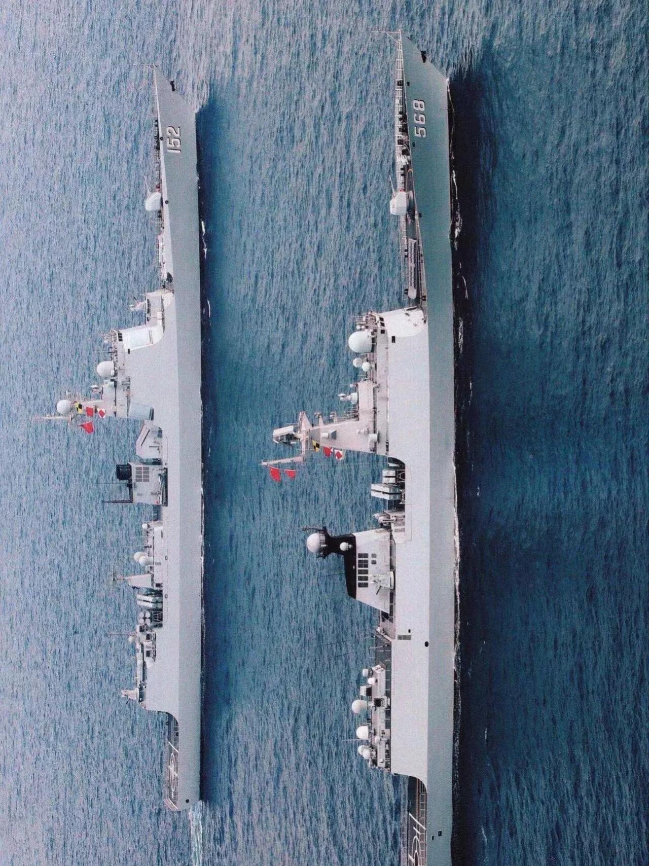 图片中的是中国海军两型驱护舰，一艘052C型驱逐舰，一艘054A型护卫舰，这两艘