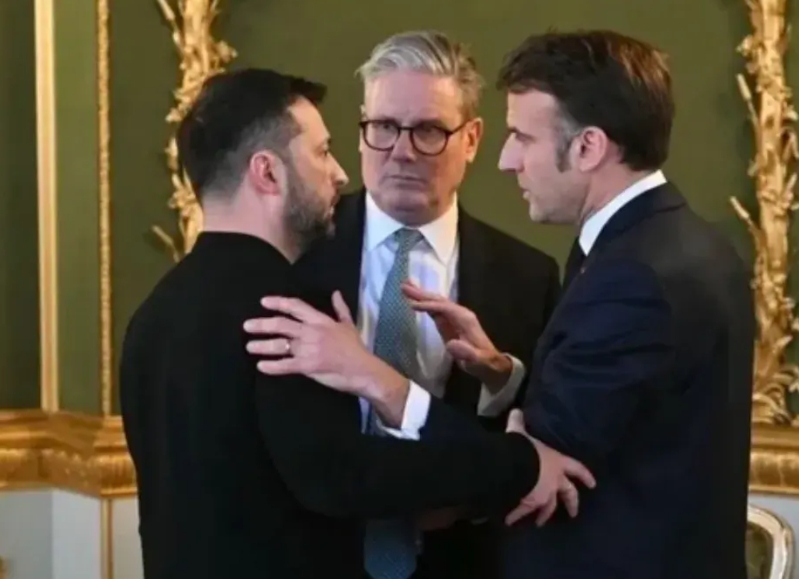泽连斯基不敢独自赴美，法国马克龙和英国斯塔莫决定陪斯基一起访美！司机的意思是：老