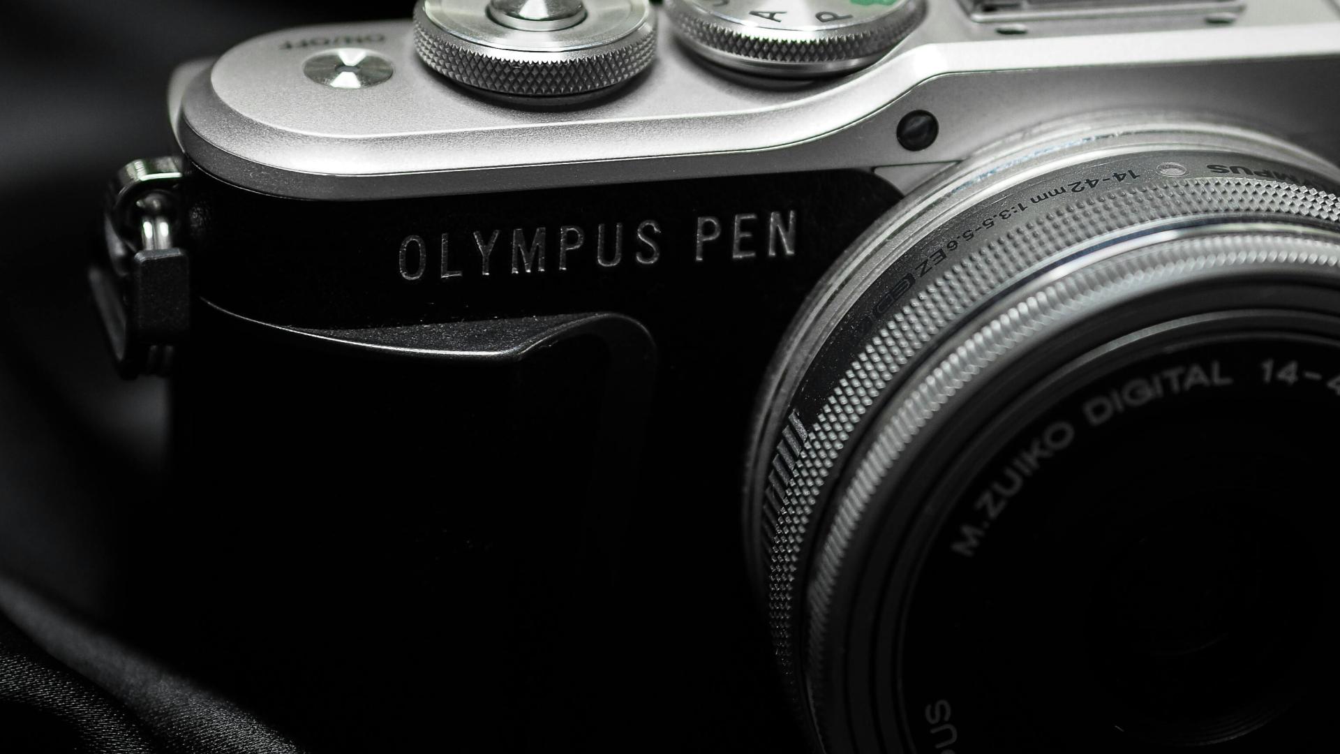 为何一定要有一只定焦镜头？