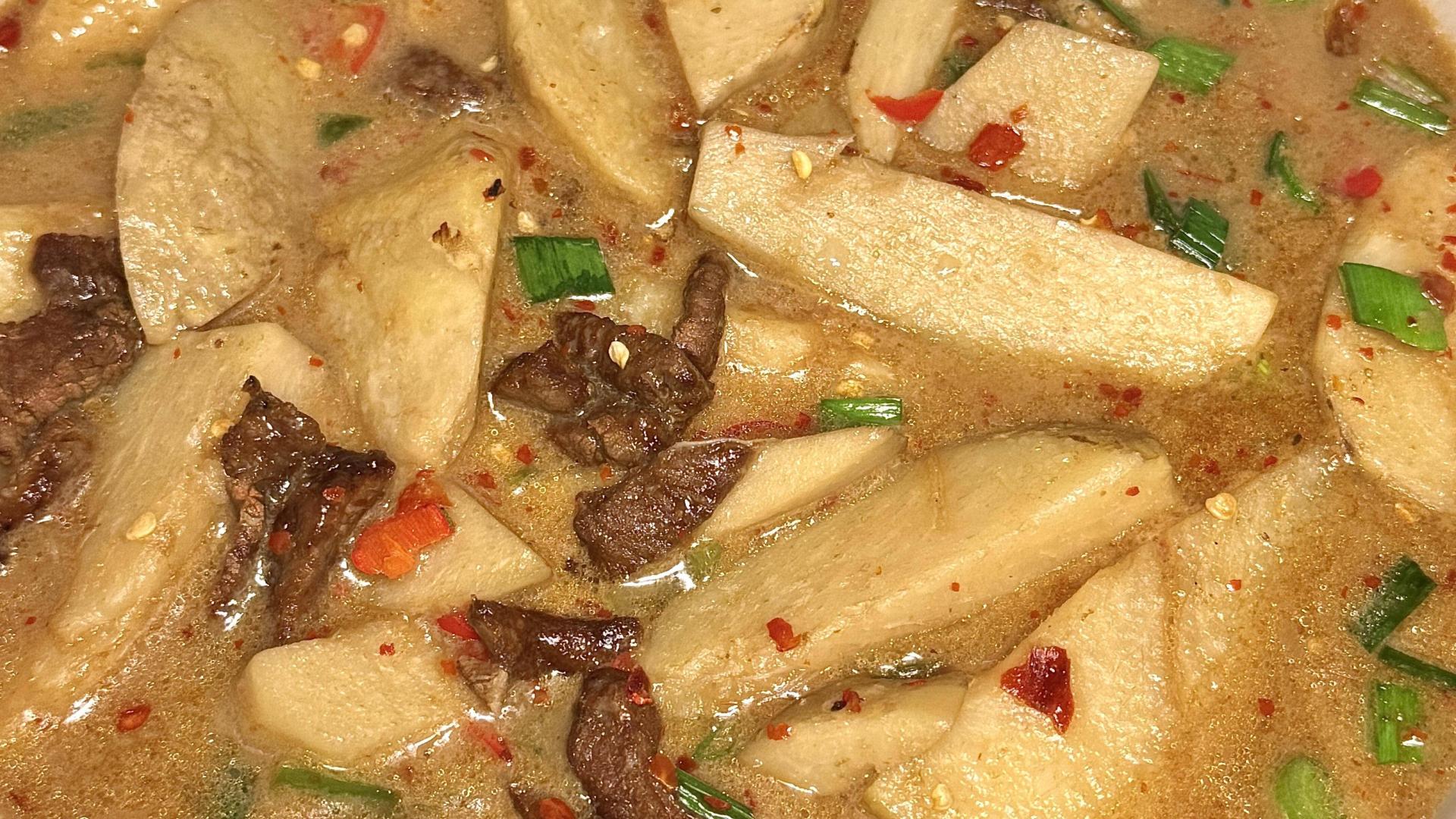 芋子滑牛肉：绵糯与鲜嫩的云端热恋