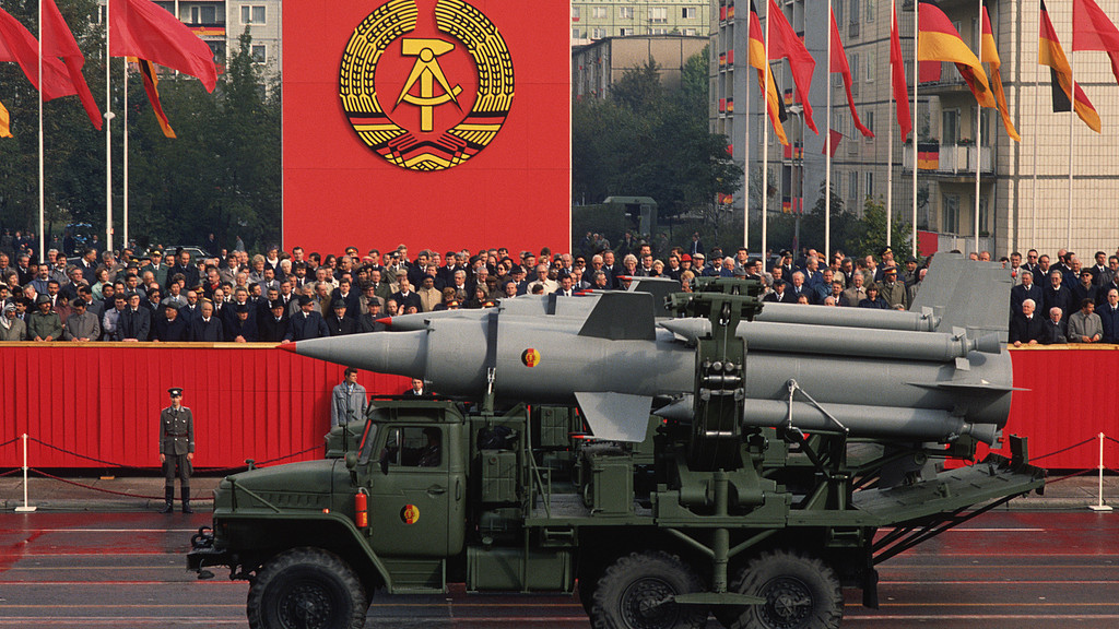 全民所有的判别标准，全民所有企业的利润分给全体人民，才是全民所有