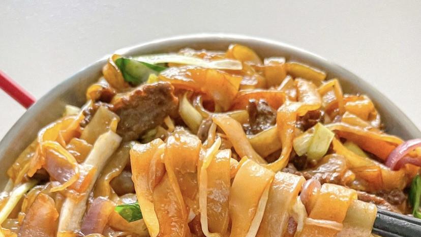 干炒牛河：镬气里的烟火人生