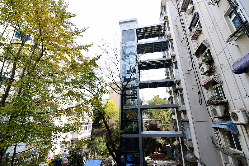 房产新谈 “共享电梯”来了!旧房安电梯有“新方案”,1、2楼不用反对了