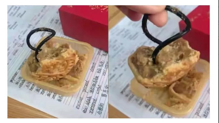 广东佛山，女生拿刀切月饼，发现怎么也切不开！