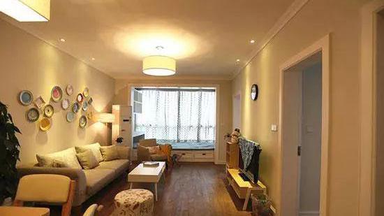 我家75平新房，入户鞋柜就把朋友迷住了，阳台榻榻米更能当一间房