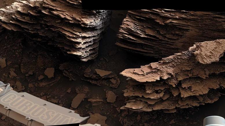 “好奇号”漫游车拍下因水而形成的火星景观的令人惊叹的图像