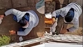 女寝楼下光天化日有一男子偷闻女生挂在楼下的内衣，整个过程被拍下