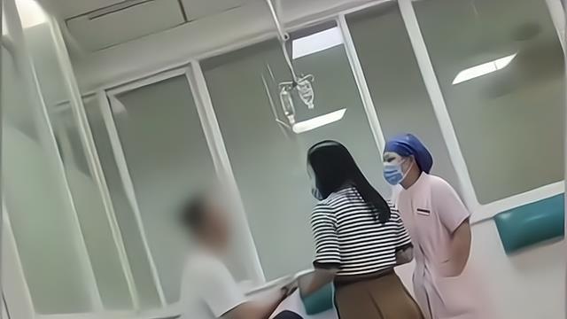 广东：男子在医院打骂妻子，妻子不吭声也不躲闪，护士劝架被误伤