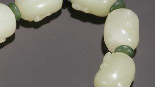 铜币|和田玉罗汉手串