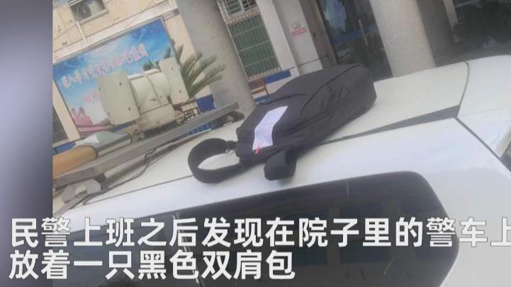 浙江杭州，一男子将两台电脑放在警车车顶，留纸条：“给个改正机会，谢谢”