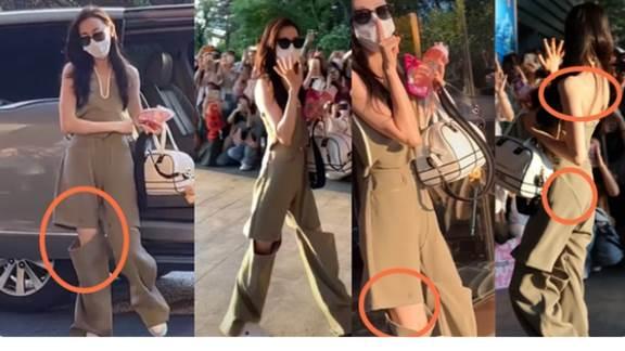 热巴正面硬刚金星，穿深V露背装现身机场，外网发视频大秀事业线