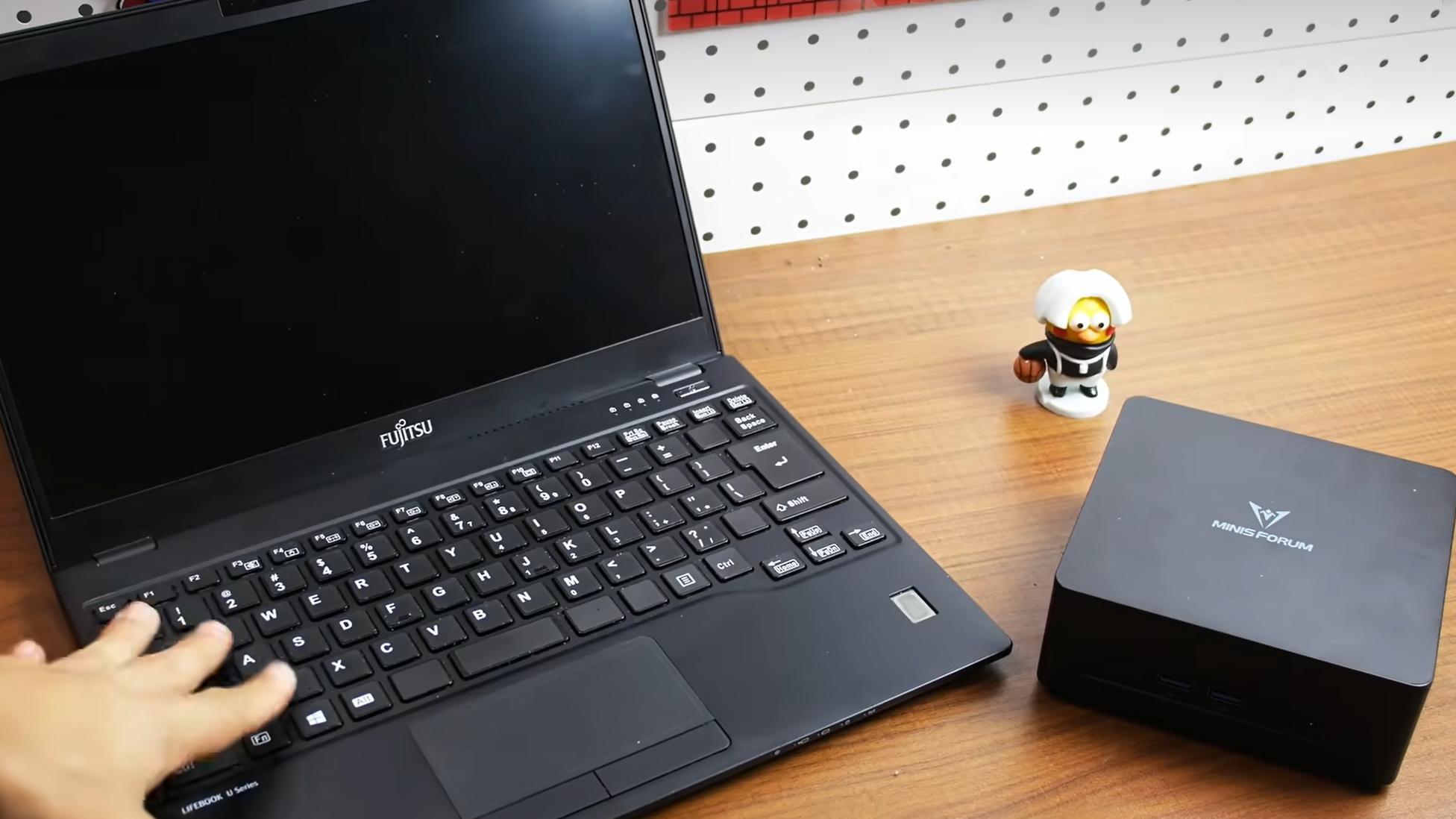 告别大机箱！UM690L Slim迷你主机这台0.8L小钢炮，性能强到不像话