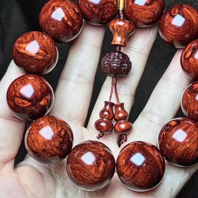 紫檀瘤疤珠子开裂之谜：原因与解决方案一网打尽，文玩爱好者要看