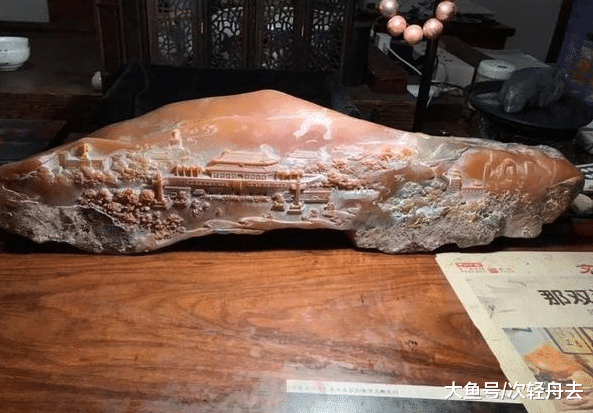 ＂黄黄的石头，玉雕师雕出一条长安街，壮观＂