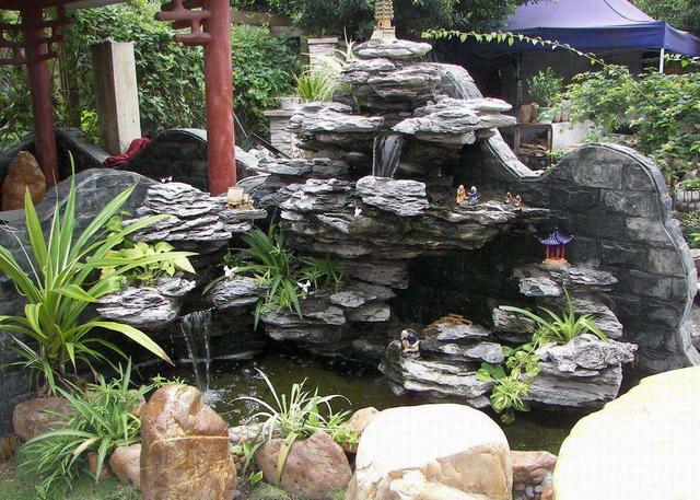 如果家里有个院子，就建个这样的鱼池吧，越住越富贵，真是太美了