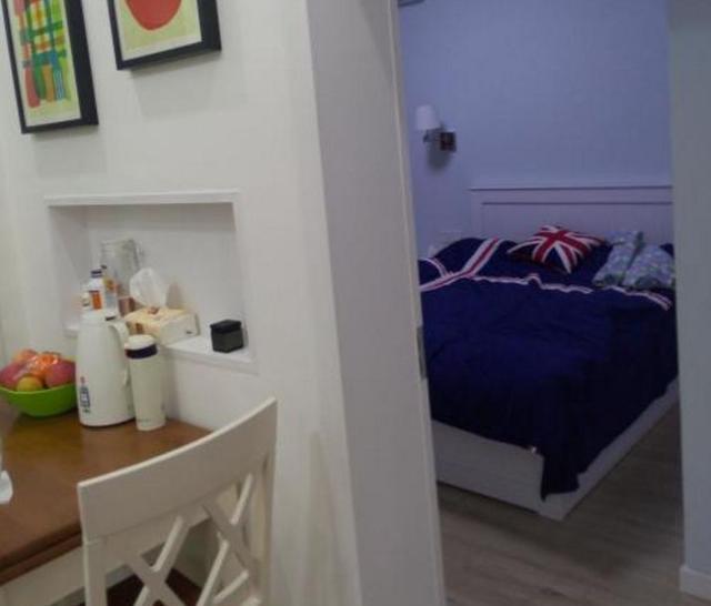 她上海买50平房摆下3张床，半个平方不浪费，卧室让网友全都点赞