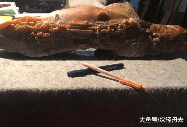 ＂黄黄的石头，玉雕师雕出一条长安街，壮观＂
