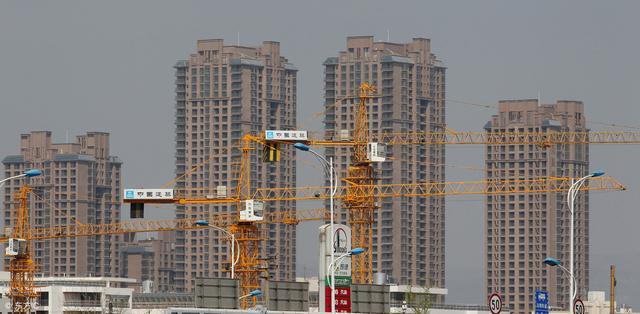 土地流拍房價下降中介關門 樓市危局何去何從