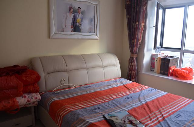 为了讨老婆结婚，我贷款几十万在市里买了房，可现在竟开心不起来