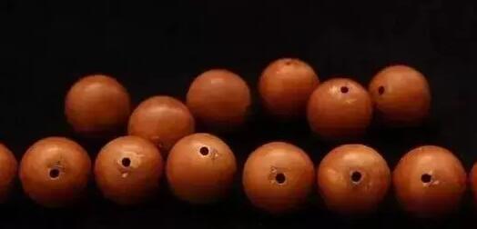 「橄榄核」曾经炒作到咋舌高价的正圆橄榄核光珠，现在还有人玩吗？