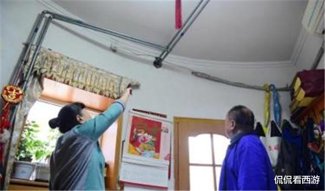 日军|祖辈五代人住日军炮楼55年,暖气从弹孔进入花了十余年