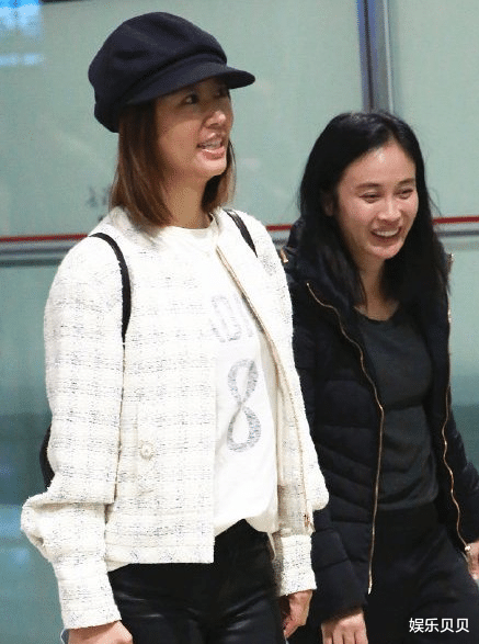林心如|林心如素颜近照,长发披肩穿粉色外套,不开美颜滤镜小麦肤色也美