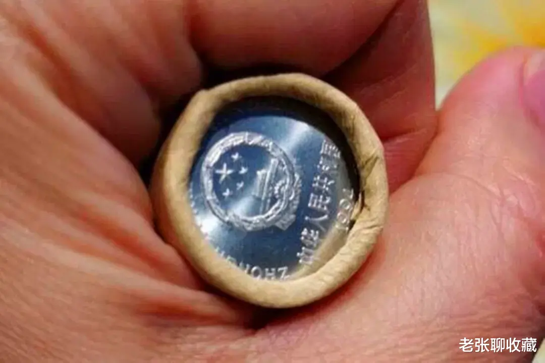 菊花1角|印有这四个数字的国徽硬币，一卷价值1400元， 你能找到吗？