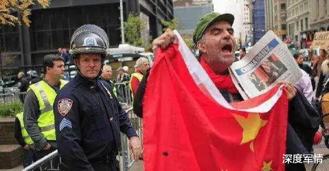 「美国」北京时间6月7日，美街头频现五星红旗，高举中国报纸！