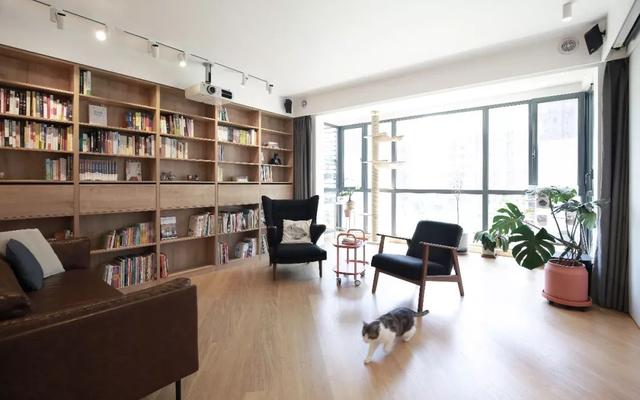 |客厅不看电视,装个书架设计,满屋书香气!