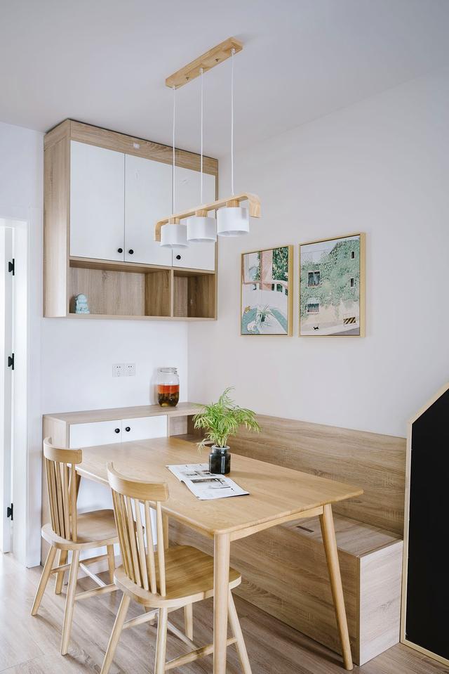 |她家52平两房，一家四口人住，客餐厅一体化，储物空间做到极致