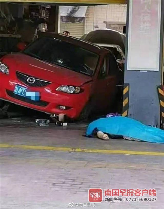 光明网视频|悲剧！南宁一车主检查车辆时不幸被压死