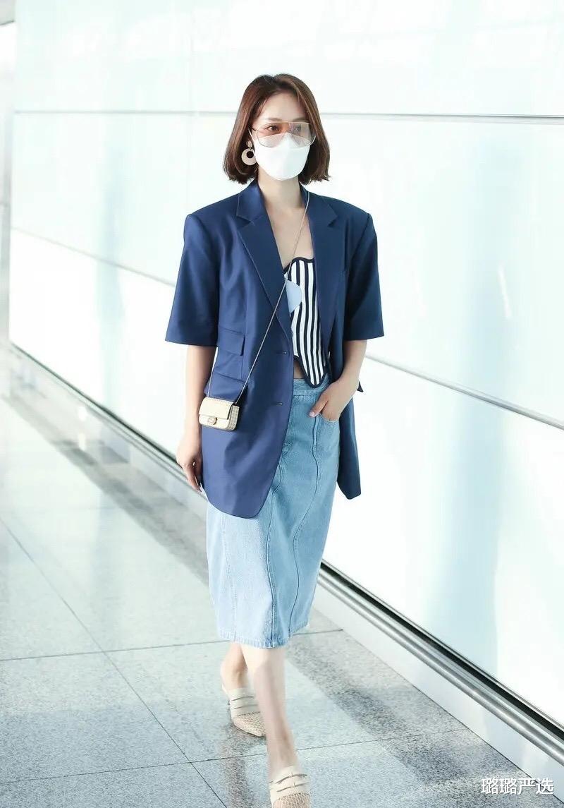 [阔腿裤]“舞美人甜”蓝盈莹露脐装配阔腿裤现身机场，标志性短发清爽迷人