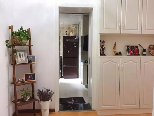 @晒晒新房，全屋铺木地板特别有档次，电视墙漂亮极了，家人很喜欢