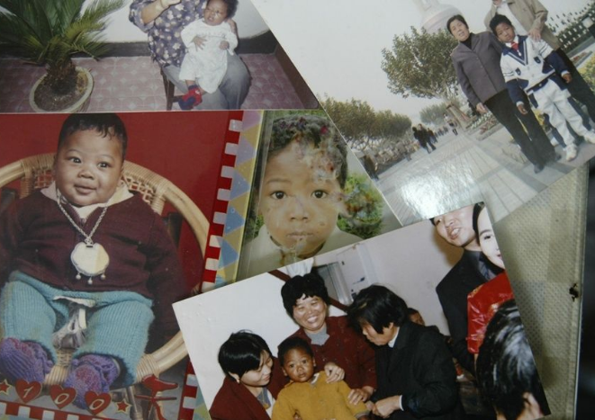 颜夕趣史|上海阿婆在草丛捡到一黑人男婴，好心收留抚养20年，现状如何？