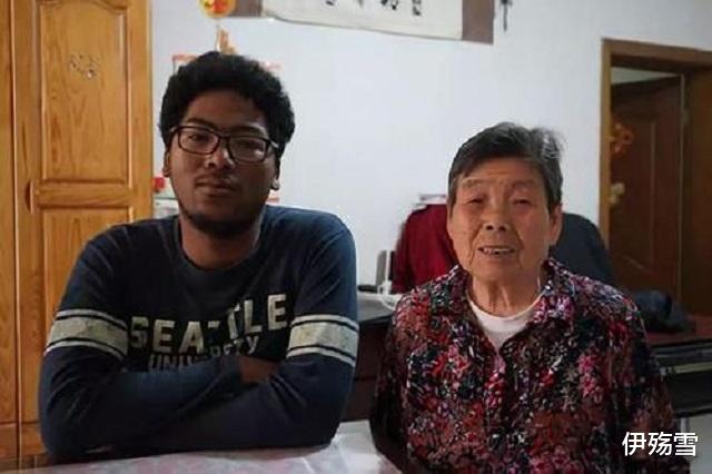 上海市|上海大妈路边捡回一个小黑人，悉心抚养20年，长大后：我养你