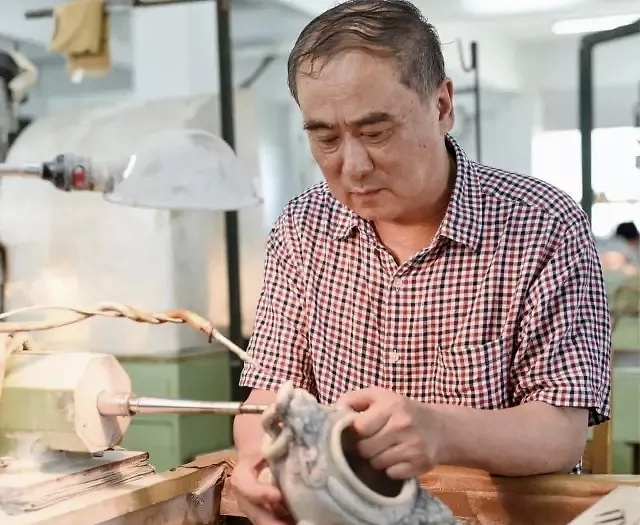 |玉雕大师——江春源