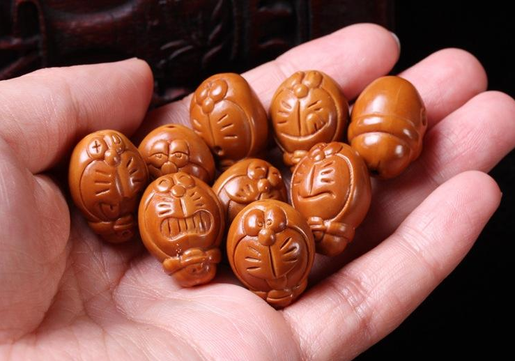 【小叶紫檀】百匠诀核雕-如何辨别橄榄核机雕还是手雕？